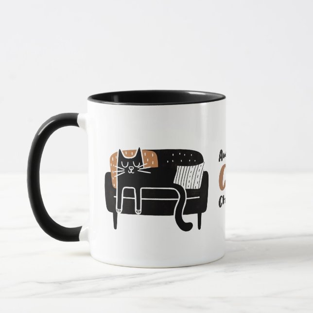 Whimsical Black Cat Sleeping on Couch Mug (Left)