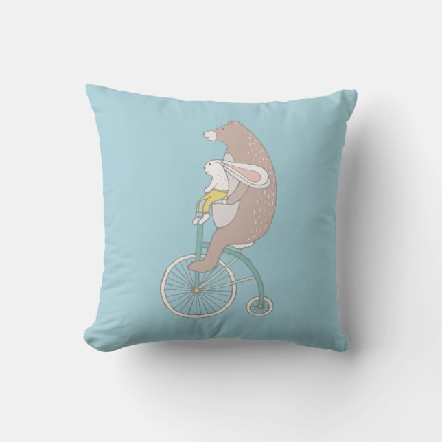 Whimsical Bunny and Bear Riding a Bike Cushion (Front)