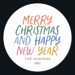 Whimsical Colourful Merry Christmas Happy New Year Classic Round Sticker<br><div class="desc">Elevate your holiday stationery,  crafts of gift wrap with these personalised stylish holiday stickers.  Featuring whimsical styled typography in bright colours.</div>