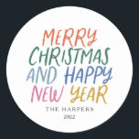 Whimsical Colourful Merry Christmas Happy New Year Classic Round Sticker<br><div class="desc">Elevate your holiday stationery,  crafts of gift wrap with these personalised stylish holiday stickers.  Featuring whimsical styled typography in bright colours.</div>
