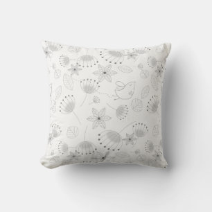 Whimsical Floral Pattern on White Cushion