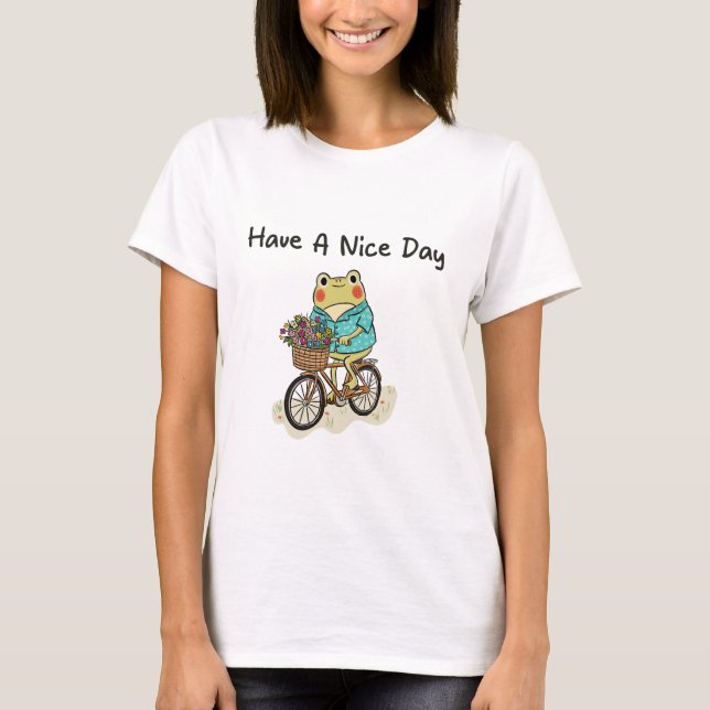Whimsical Frog Riding A Bike Illustration T-Shirt (Front)