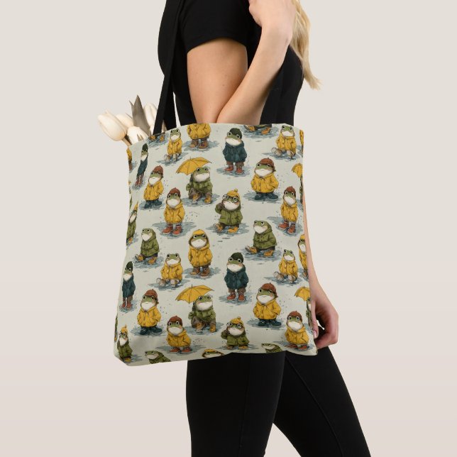 Whimsical Frogs in Raincoats Pattern Tote Bag (Close Up)