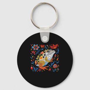 Whimsical Illustrated Frog With Vibrant Floral Bac Key Ring