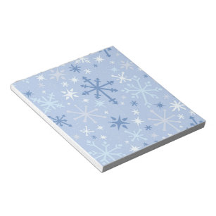 Whimsical snowflake flurry in icy blues notepad