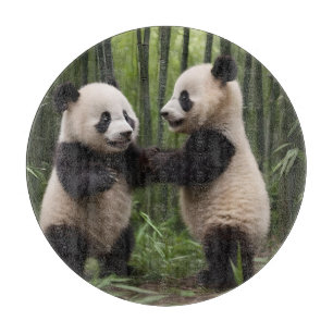Whimsical Wonders: Baby Pandas Play in Forest Cutting Board