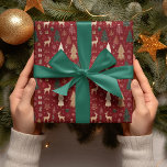 Whimsical Woodland Christmas Wrapping Paper<br><div class="desc">"This enchanting design features delicate reindeer adorned with subtle patterns, surrounded by lush evergreen trees, sparkling snowflakes, and beautifully wrapped presents—all set against a rich, warm red background. The perfect blend of classic holiday spirit and cozy woodland magic, this wrapping paper will bring warmth and joy to every gift you...</div>