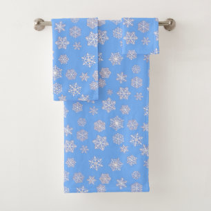 White 3-d snowflakes on an ice blue background bath towel set
