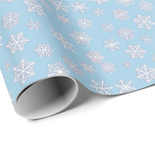 White 3-d snowflakes on an ice blue background wrapping paper