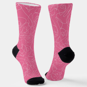 White abstract doodles on pink background socks