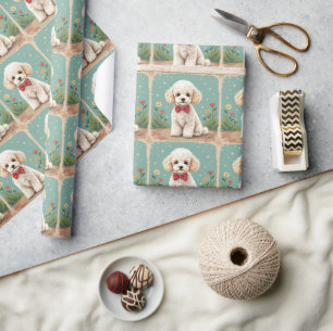 White adorable poodle with bow tie wrapping paper