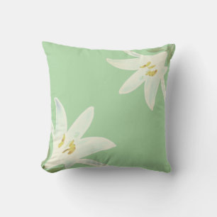 White Amaryllis Flowers on Light Lime Green Cushion
