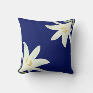 White Amaryllis Flowers on Navy Blue Cushion