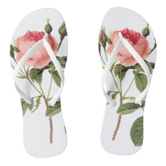 White anchors of a rose on each foot thongs