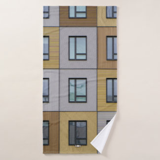 White and beige building windows bath towel