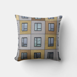 White and beige building windows cushion