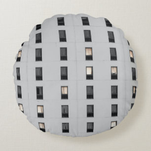 White and black concrete building round cushion