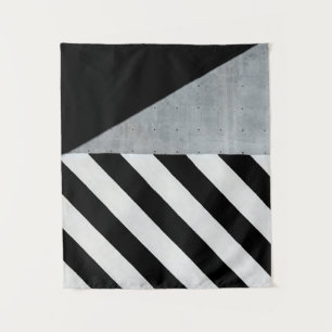 White and black diagonal striped paint on wall tapestry