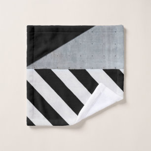 White and black diagonal striped paint on wall wash cloth