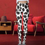 White And Black Spots Pattern Safari Leopard Print Leggings<br><div class="desc">Unleash your wild side in our leopard print leggings! With bold black spots on a white base,  they're made from soft,  stretchy fabric,  ideal for yoga,  gym,  or casual wear. Personalize (optional) with your own image for a unique touch. Elevate your style today!</div>