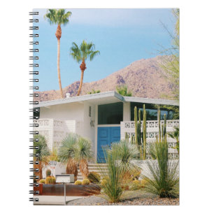 WHITE AND BLUE CONCRETE BUILDING NEAR GREEN TREES NOTEBOOK