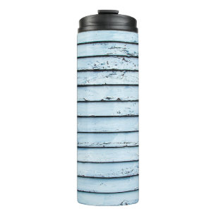 White and blue wooden surface thermal tumbler