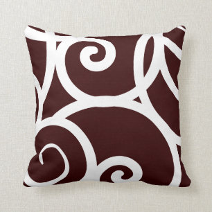 white and brown abstract pattern pillow