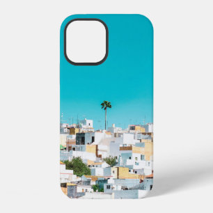 WHITE AND BROWN CONCRETE HOUSES UNDER BLUE SKY DUR iPhone 12 CASE