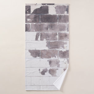 White and brown concrete wall bath towel