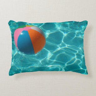 White and multicolored beach ball decorative cushion