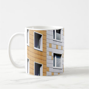 White and orange building coffee mug