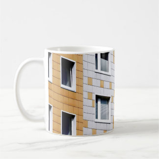 White and orange building coffee mug