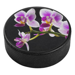White and purple orchid hockey puck