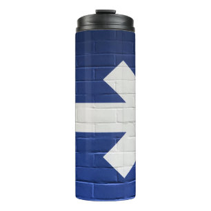 White arrow painted on brick wall thermal tumbler