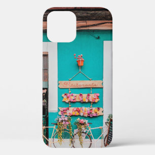 WHITE BICYCLE PARKED BESIDE TEAL PAINTED CONCRETE  iPhone 12 CASE