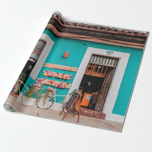 WHITE BICYCLE PARKED BESIDE TEAL PAINTED CONCRETE WRAPPING PAPER