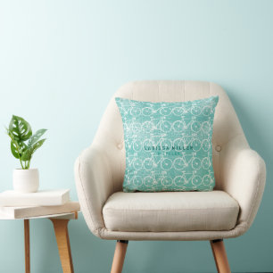 white bicycles distressed on pale blue cushion