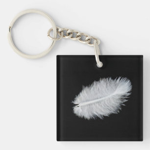 White bird's feather key ring