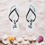 White Black Name Bride Bridal Party Bachelorette Thongs<br><div class="desc">A simple black and white minimalist typography design for a bridal shower, bachelorette party or beach wedding. The text is customisable and can be personalised with your own name and bride slogan. For example, Bride Squad instead of Team Bride, Bride repeated on the left and right foot, or something else....</div>