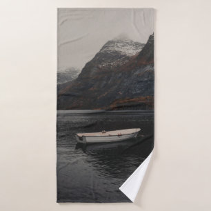 WHITE BOAT ON BODY OF WATER NEAR MOUNTAINS BATH TOWEL