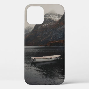 WHITE BOAT ON BODY OF WATER NEAR MOUNTAINS iPhone 12 CASE