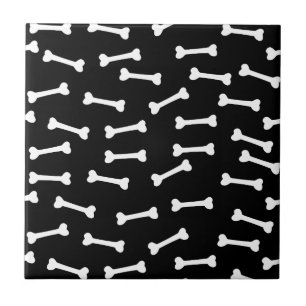 White bones on black tile