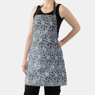 White botanical design on grey apron