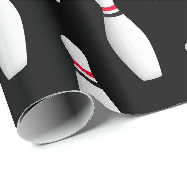 white bowling pins on black wrapping paper (Roll Corner)