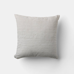 White brick wall cushion