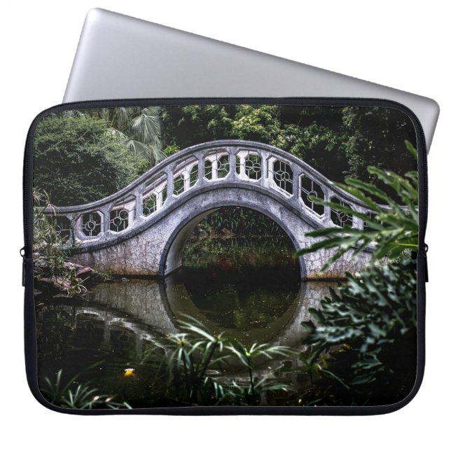 WHITE BRIDGE SURROUNDED BY TREES LAPTOP SLEEVE (Front)