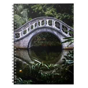 WHITE BRIDGE SURROUNDED BY TREES NOTEBOOK