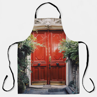 WHITE BUILDING SHOWING CLOSED RED WOODEN DOOR APRON