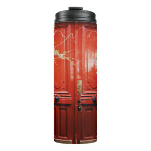WHITE BUILDING SHOWING CLOSED RED WOODEN DOOR THERMAL TUMBLER