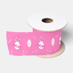 White bunny heads on pink satin ribbon
